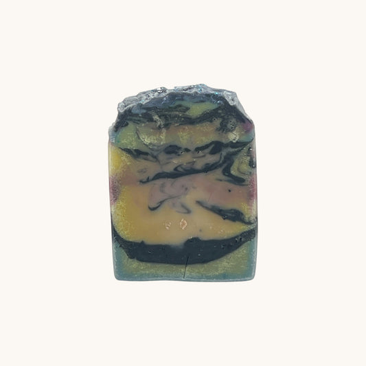 Back view of Memaw’s After Dark tallow soap bar showing rich natural color swirls and smooth texture.