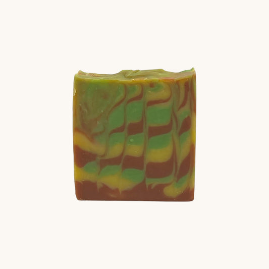 Back view of Memaw’s Autumn Ember tallow soap bar showing natural swirled pattern and rustic finish.