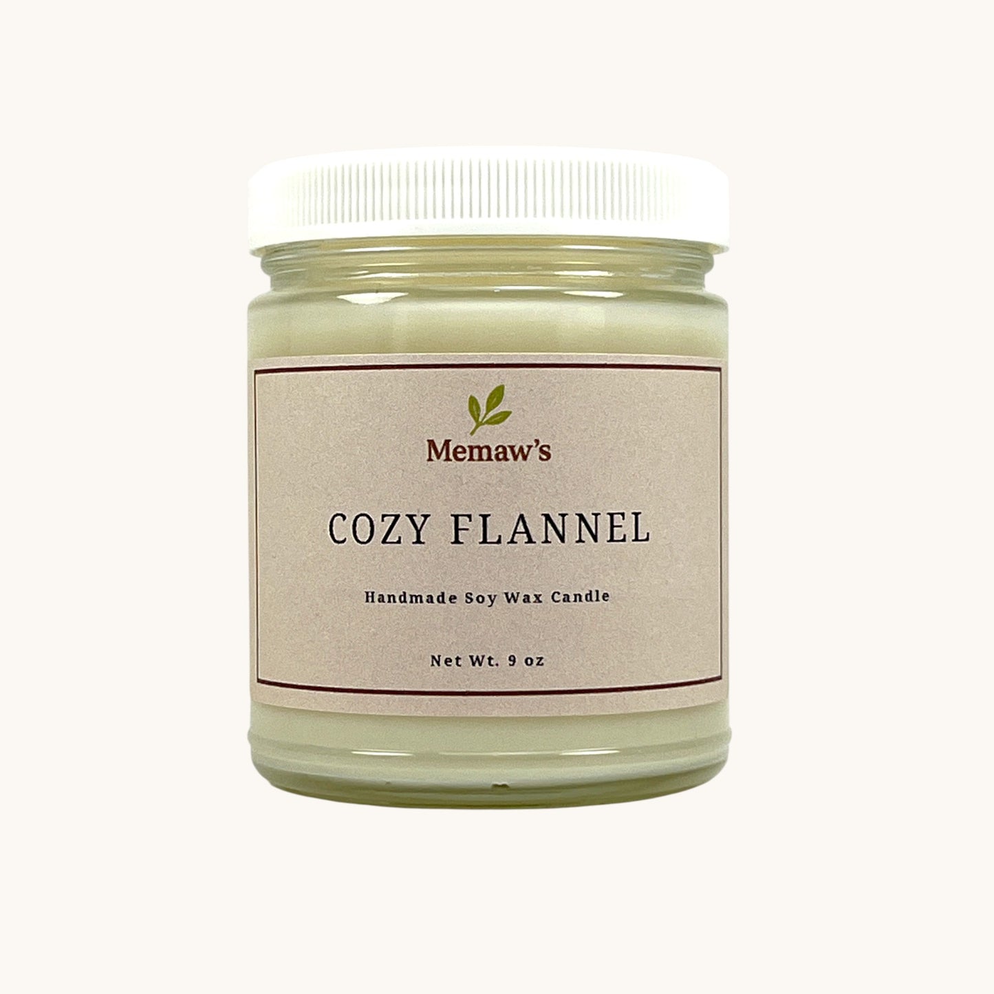 Memaw’s Cozy Flannel soy wax candle in 9 oz glass jar.