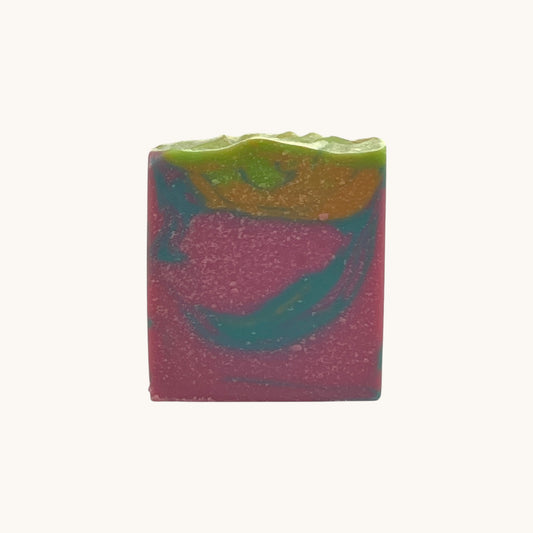 Back view of Memaw’s Million Wishes tallow soap bar showing colorful marbled design and natural texture.