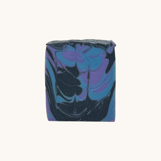 Back view of Memaw’s Stormy Monday tallow soap bar showing natural swirls and smooth finish.