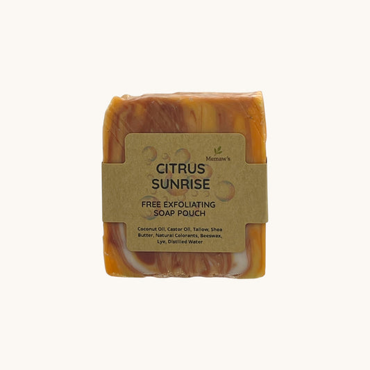 Memaw’s Citrus Sunrise tallow soap bar with label, handcrafted natural soap in bright orange and yellow tones.