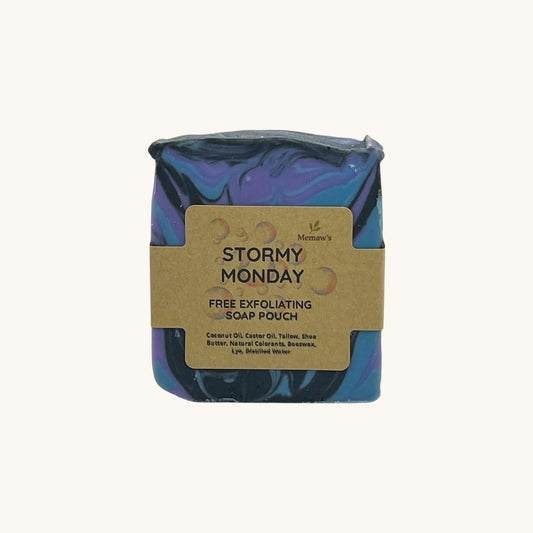 Memaw’s Stormy Monday tallow soap bar with label, handcrafted natural soap in blue, purple, and charcoal marbled tones.